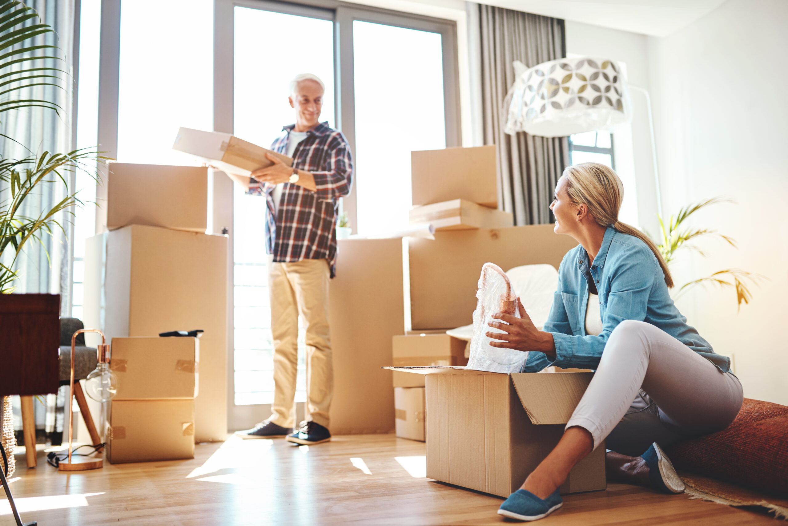 Homeowners packing for a downsizing move