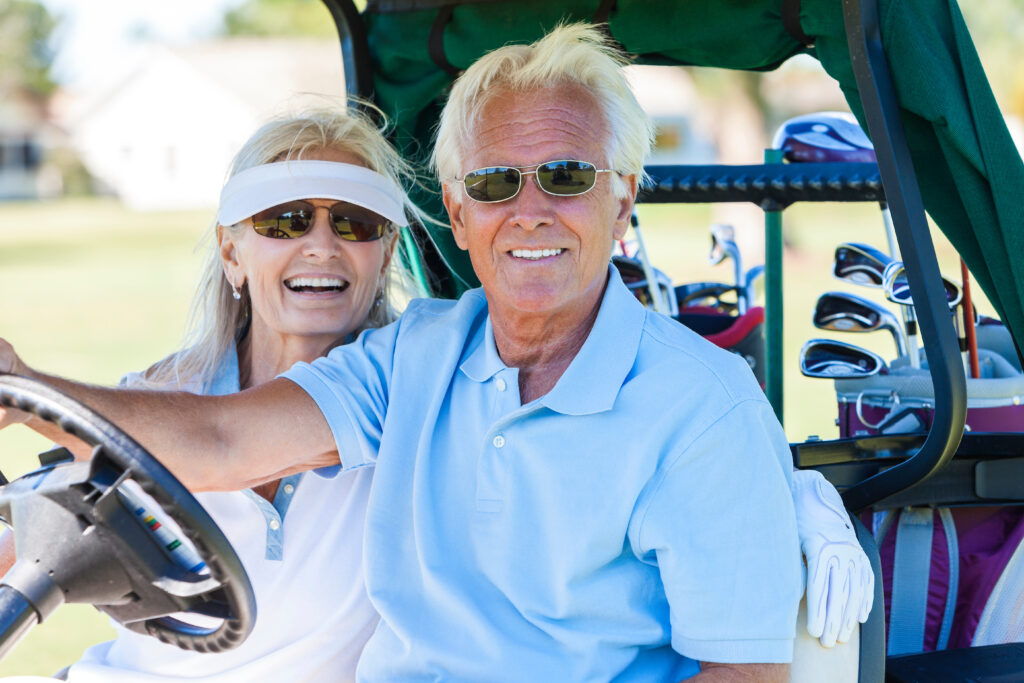 Couple in a golf cart