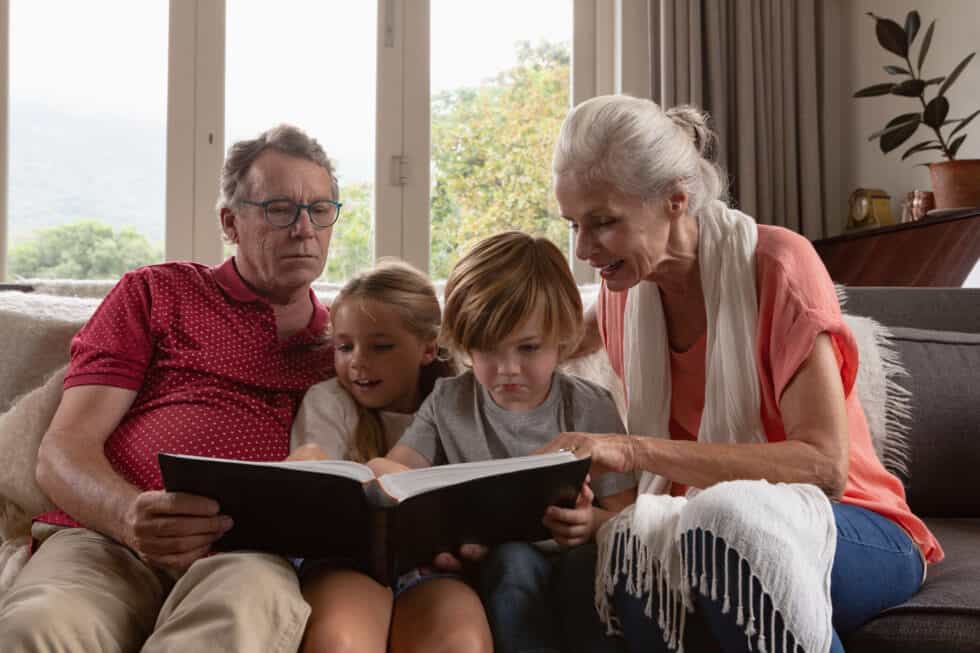 Family-looking-at-photo-alblum